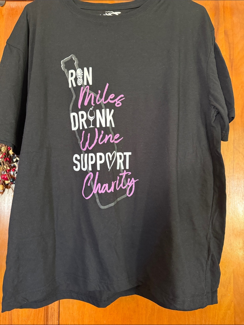 Women’s Black Short Sleeve Tee - Run Miles Drink Wine Support Charity